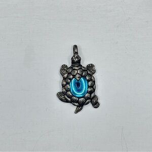 Sterling Silver Turtle Pendant with aqua blue Accent